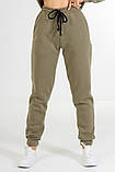 Теплі штани джогери жіночі з манжетами Жіночі спортивні штани на флісі Зимові теплі штани жіночі 1207, фото 2