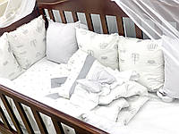 Комплект ліжка в дитячій ліжечці з бортиками подушками