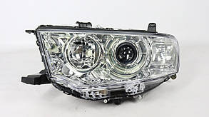 Фара Mitsubishi Pajero Sport 2008-2015 (ліва)