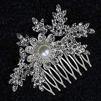 Гребінець у зачіску сріблястий металевий з кришталевим камінням квіточки розмір 10х4 см на 10 зубців