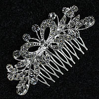 Гребінець у волосся сріблястий металевий із кришталевим камінням метелика з пелюстками розмір 10х4 см