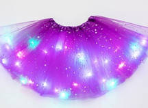 Дитяча спідниця нарядна карнавальна фіолетова, що світиться, довжина - 28 см (Поні, Рапунцель, Софії тощо)