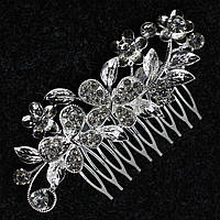 Гребінець у волосся сріблястий металевий із камінням метелика квіточки з пелюстками розмір 10х4 см