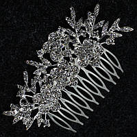 Гребінець у зачіску сріблястий металевий з кришталевим камінням квіточки розмір 13х9 см на 10 зубців