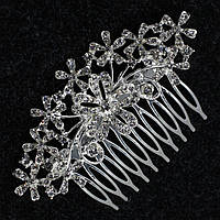 Гребінець у зачіску сріблястий металевий зі стразами квіточки із завиточками розмір 10х4 см на 10 зубців