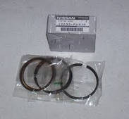 Поршневі кільця на двигуні 