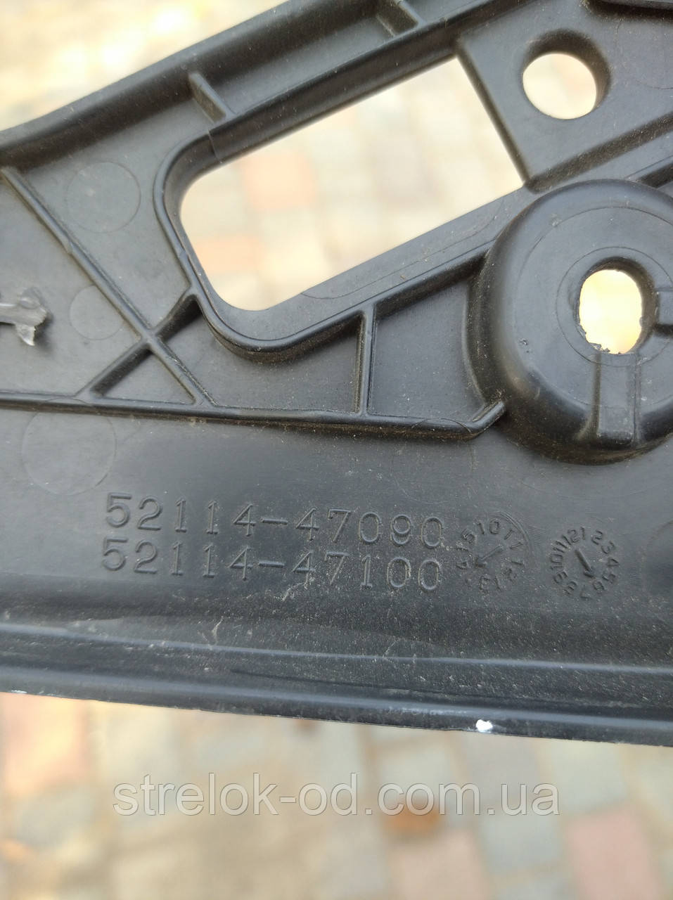 Панель номерного знака Toyota 5211447100