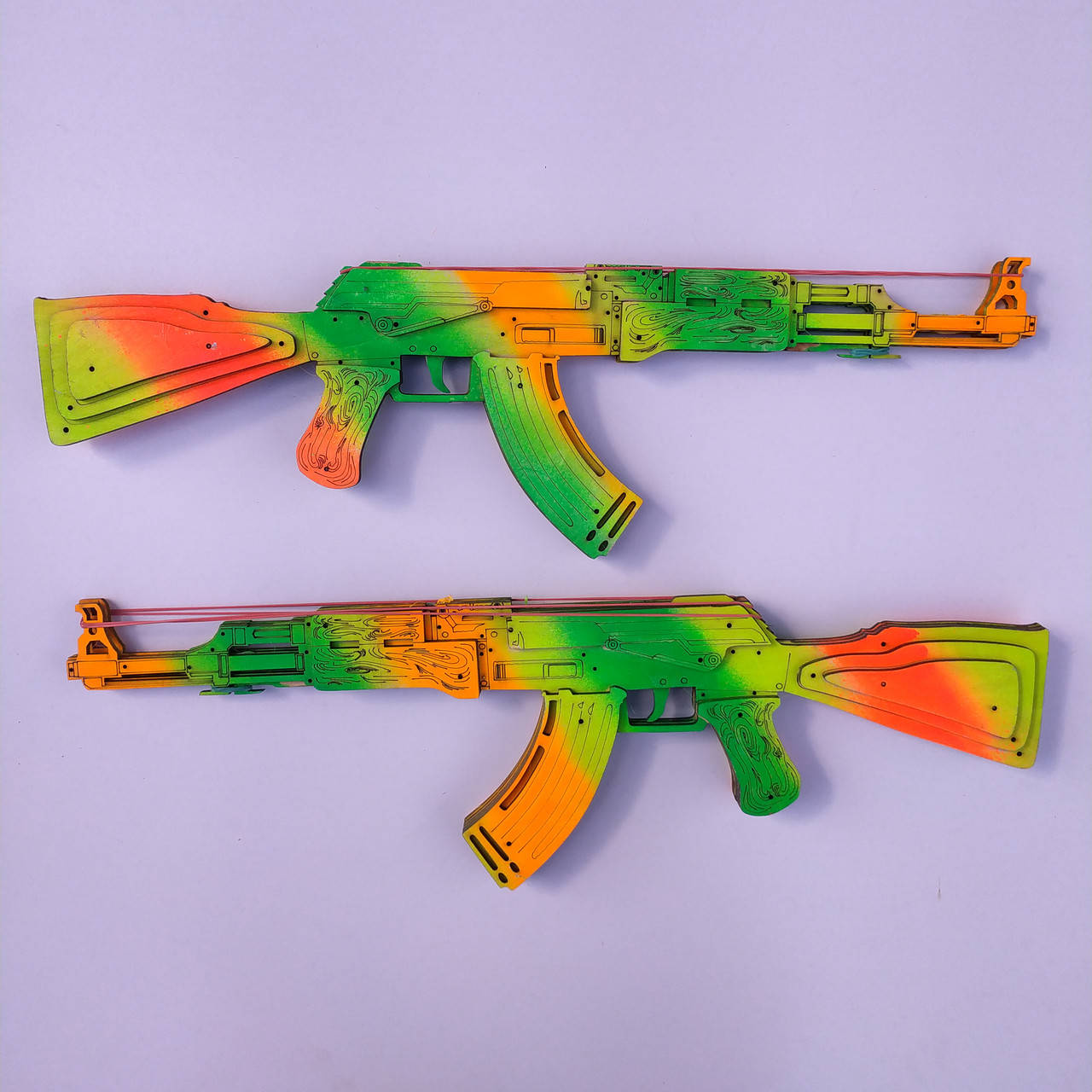 

Деревянный Автомат Калашникова (АК-47) из CS:GO (КС:ГО) Стреляющий Резинками. Цвет: Зелено-Оранжевый Градиент.