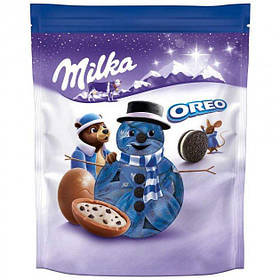 Цукерки Milka / Мілка зі шматочками печива Орео та молочною начинкою 86г