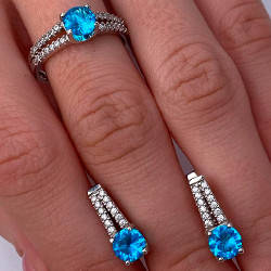 Срібний набір родований з фіанітами (колір блакитний) РН-405