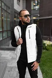 Жилети та безрукавки