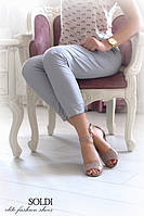 Модель "Анита" изготовлена из кожи "лак мутон" на бежевой подошве.