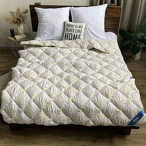Двоспальну ковдру і дві подушки