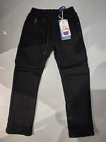 Дитячі підліткові класні зимові джинси на хлопчика 140 см на флісі чорні штани
