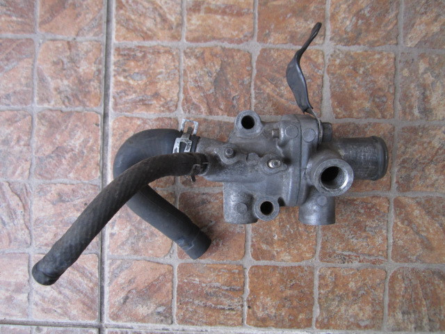 Термостат в зборі з корпусом Mazda 323 BF BG 1985 - 1994 гв. 1.7 d PN