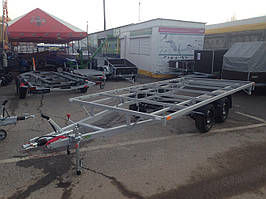 Причіп платформи 4,8 м х 2,1 м. Інерційні гальма 2,7т. Грунт.