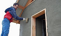 Штукатурка стін будинку