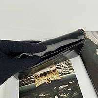 Жіночий шкіряний глянцевий гаманець на кнопці Prensiti чорний, фото 6