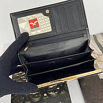 Жіночий шкіряний глянцевий гаманець на кнопці Prensiti чорний, фото 8