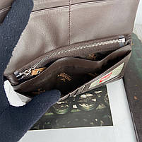 Жіночий шкіряний гаманець портмоне на кнопці Prensiti коричневий, фото 9
