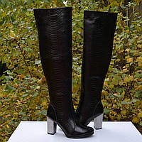Шкіряні ботфорти на високому каблуці