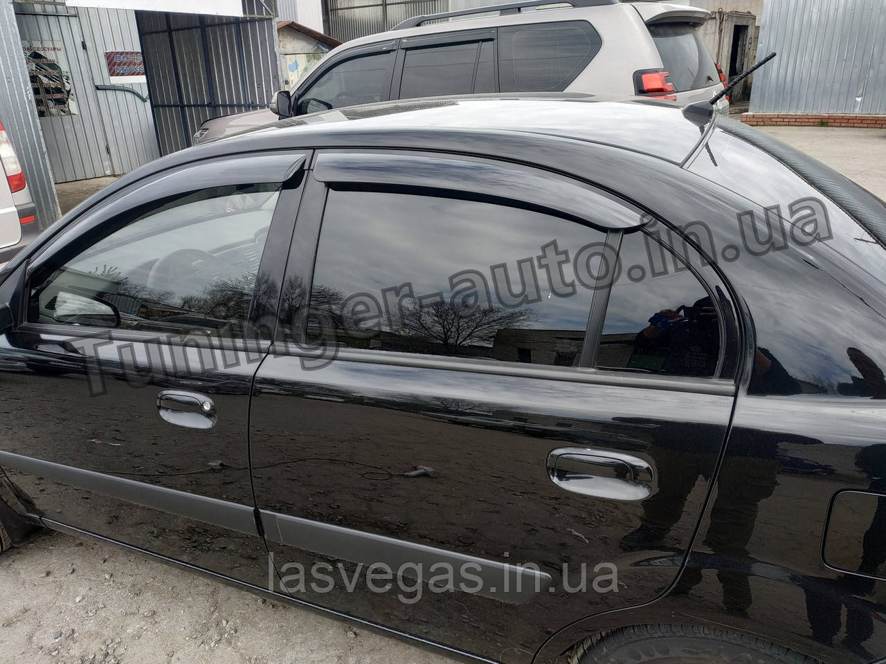 Дефлектори вікон вітровики Kia Rio 2005-2009 (Autoclover)