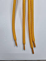 Шнурки круглі поліестер 6мм жовтий 1,25м