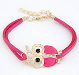 Браслет на шкіряному шнурку з фігуркою сови коралового кольору, застібка/ланцюжок золотистого кольору, фото 2