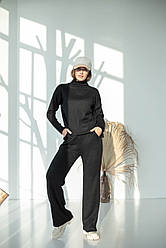 Жіночий брючний теплий костюм в чорному кольорі