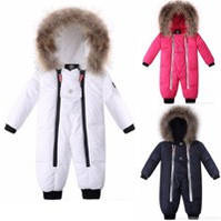 Зимові комбінезони