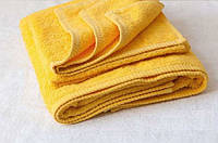 Желтое махровое полотенце Cholzer плотность 450 Турция 50х90