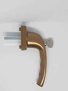 Ручка віконна HОРРЕ New York з ключиком бронза