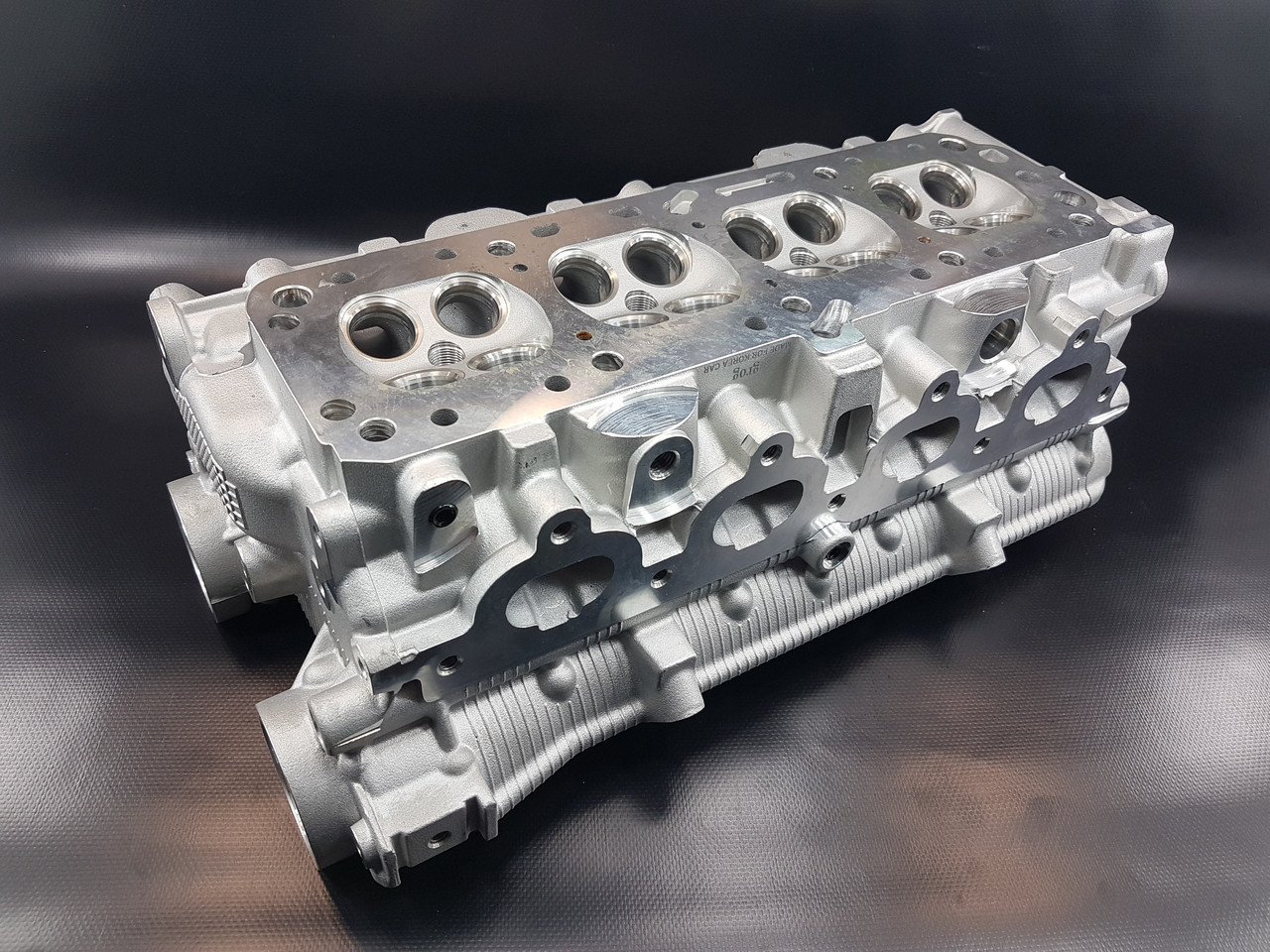 Головка блоку циліндрів (двоканальна) AVEO 1.6 , 16кл. Grog Корея, фото 1