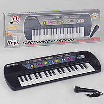 Іграшка Піаніно MQ 031 FM (36/2) на батарейках, з мікрофоном, FM Radio, 37 клавіш, мелодії, в коробк