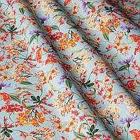 Декоративна тканина для дитячої спальні вітальні кухні Іспанія помаранчеві букетики квітів на блакитному тлі