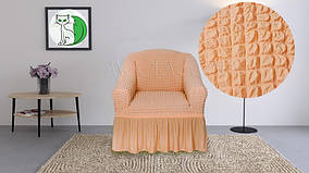 Персиковий чохол на крісло з оборкою універсальний натяжний Concordia (багато кольорів)