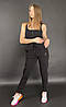 Штани жіночі спортивні утеплені з трикотажу трехніткі на флісі чорного кольору, фото 3