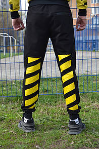 Чорні трикотажні штани з жовтим логотипом off white