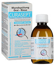 Ополаскиватель для рта Курапрокс CURAPROX КУРАСЕПТ жидкость для полоскания с хлоргексидином 0,05% 200 мл