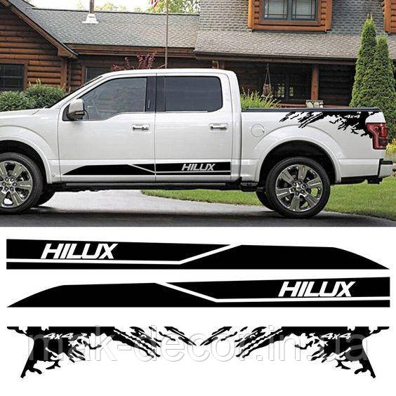 Вінілові наклейки на авто " Полоси Hilux "  15х180 см+ 30х100 см 2 сторони
