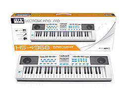 Дитячий синтезатор-піаніно Music має 49 клавіш, мікрофон, USB зарядне, працює від батарейок