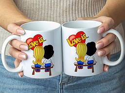 Парні білі чашки з принтом "Love is..."