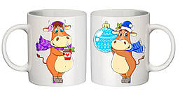 Парні білі чашки з принтом "Корівки взимку"