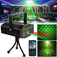 Міні лазерний проєктор із пультом  Mini Laser Stage Light Новорічна світильникузика для дому