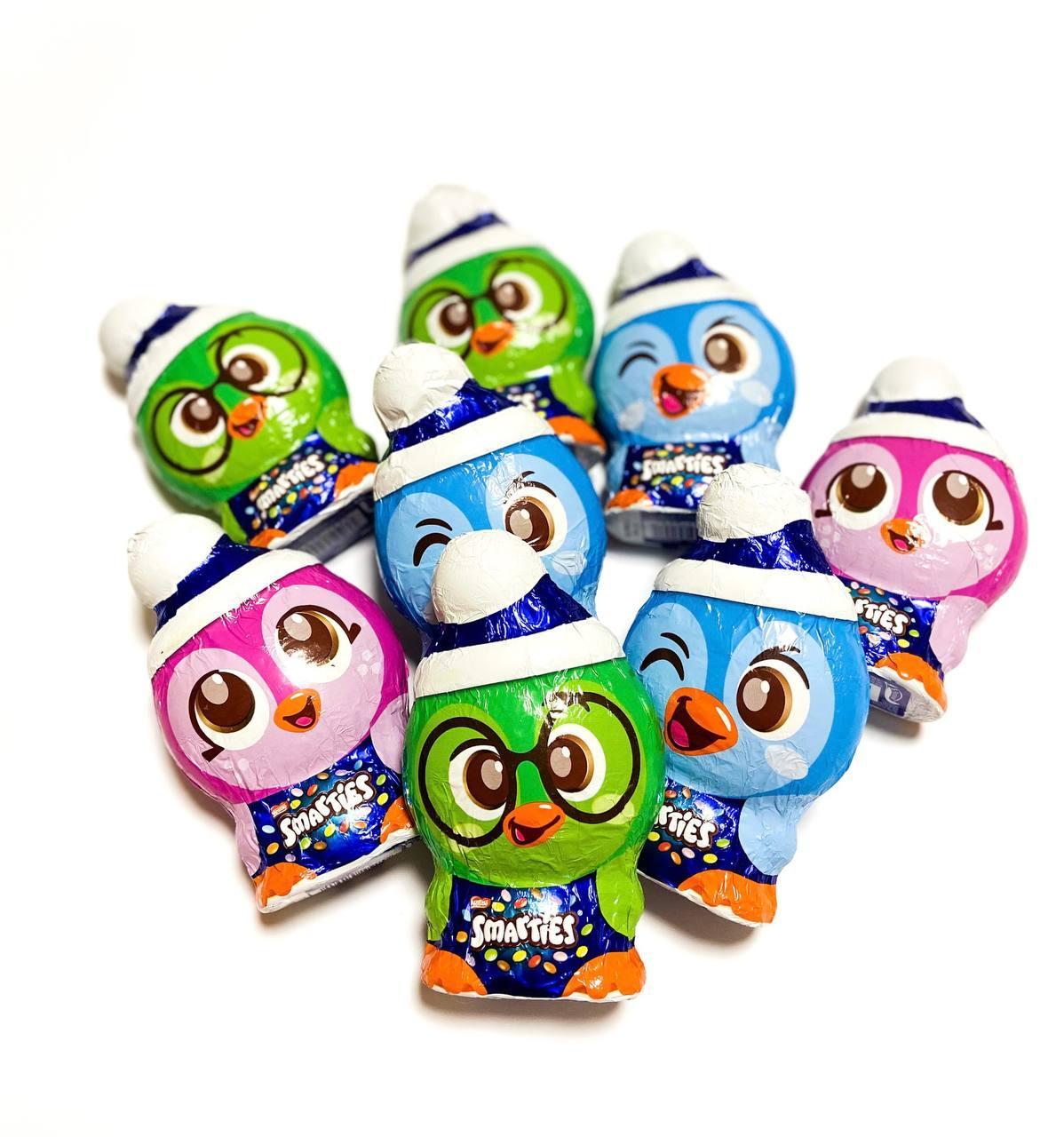 Шоколадні фігурки Nestle Smarties Пінгвін з кольоровим дражем всередині 85 гр.