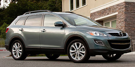 Амортизатор передній правий Mazda CX-9 від 2006 г із двигунами 3.5 3.7, Стійки Мазда сх9, фото 6