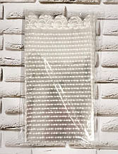 Пакет прозорий 15 см на 30 см, хвилястий край, принт сніжинка