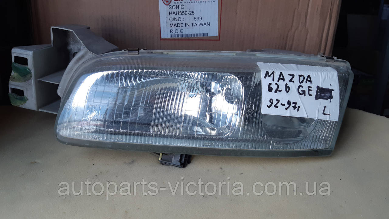 Фара Mazda 626 GE ліва 1992-1997 USA