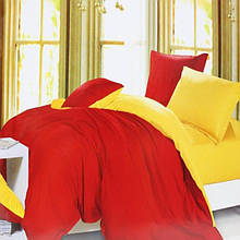 Комплект постільної білизни однотонний червоно-жовтий Бязь Premium Полуторний 150*215