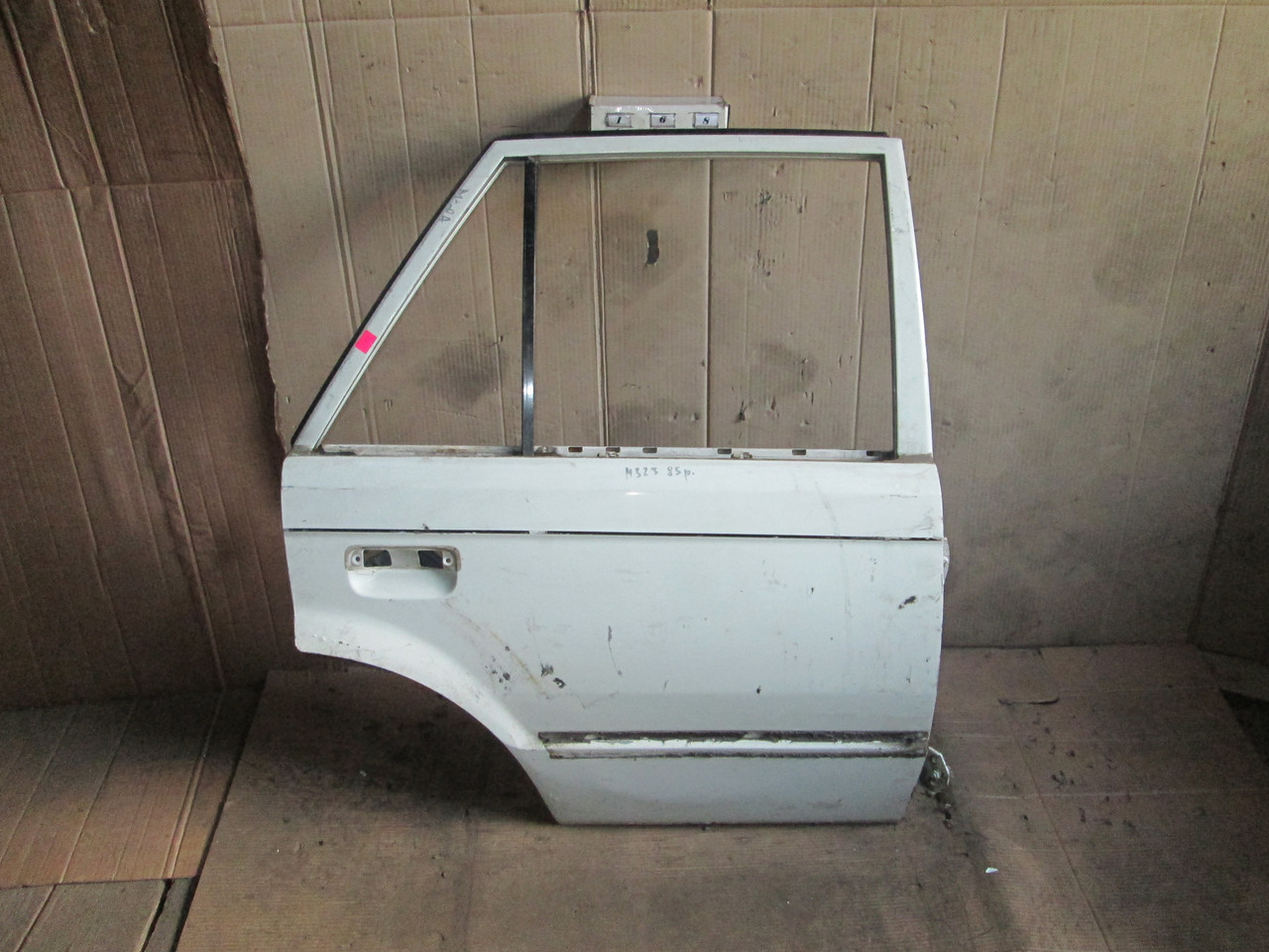 No168 Б/у Двері задня права для Mazda 323 BF 1985-1989